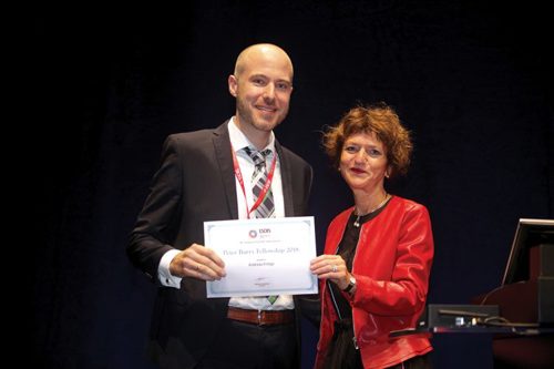 Andreas Frings with ESCRS President Beatrice Cochener-Lamar